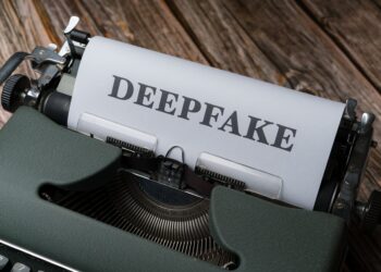 a typewriter with the word deepfake on it