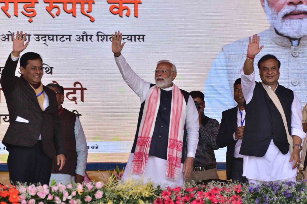Narendra Modi's Triumphant Welcome in Assam: A Sea of Supporters Amidst a Shower of Petals